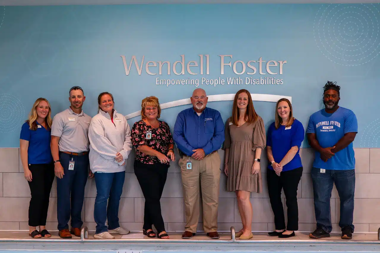 Wendell Foster’s Administration Team inside the Aquatic Center.