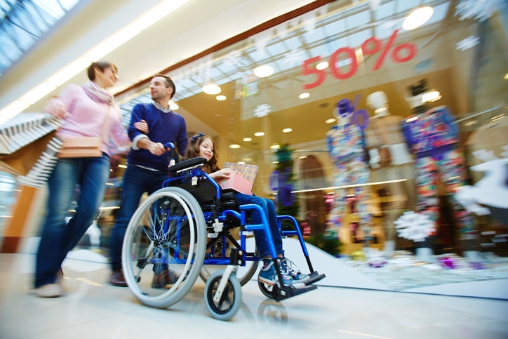 Family shopping with Wheelchair